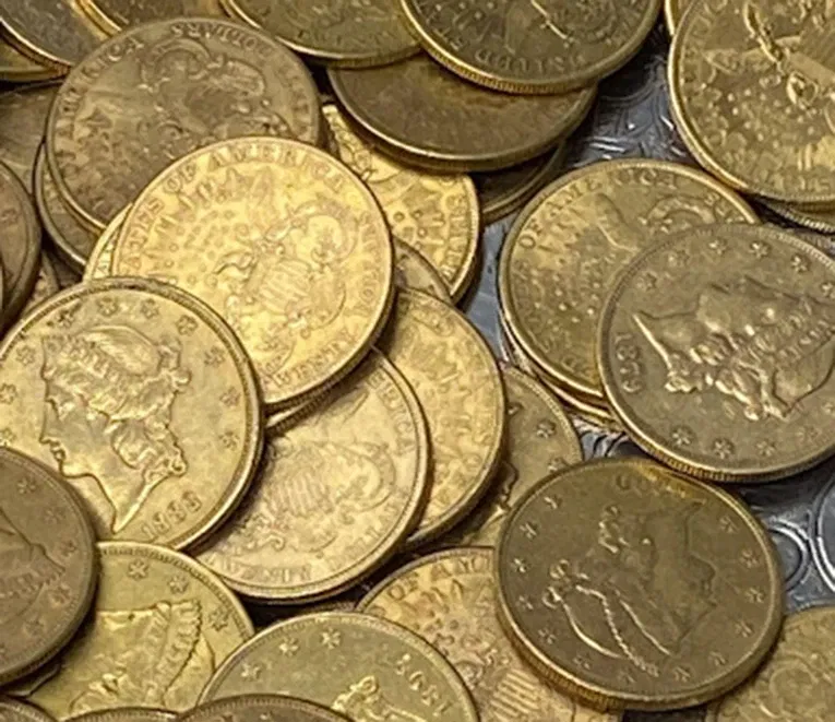 A close view of historic gold coins